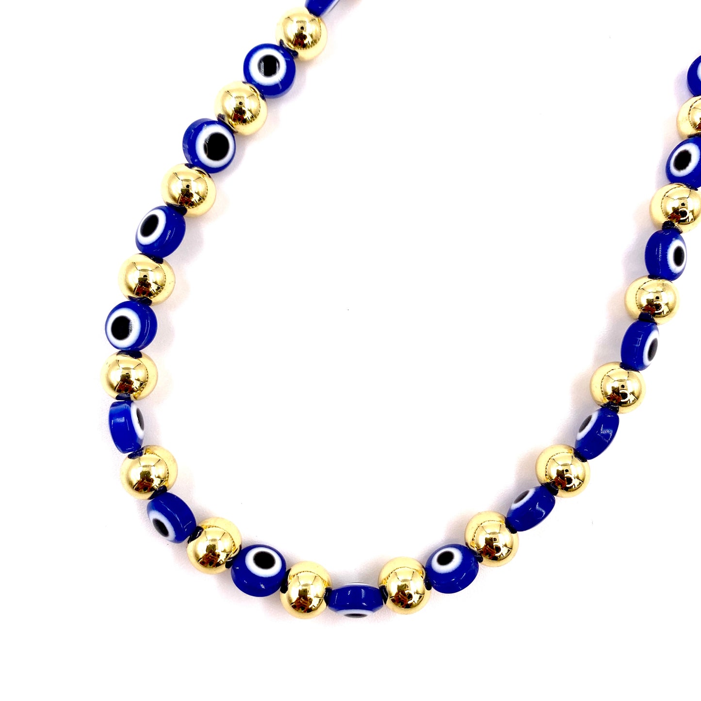 Collar con balines dorados y ojo turco azul