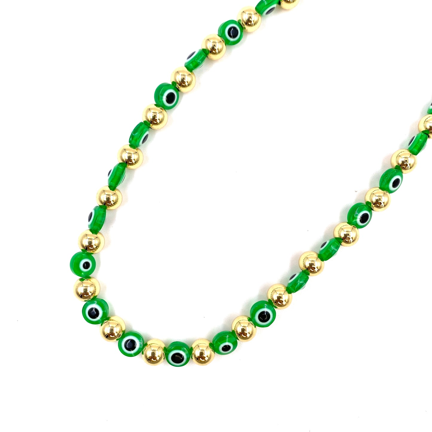 Collar con balines dorados y ojo turco verde